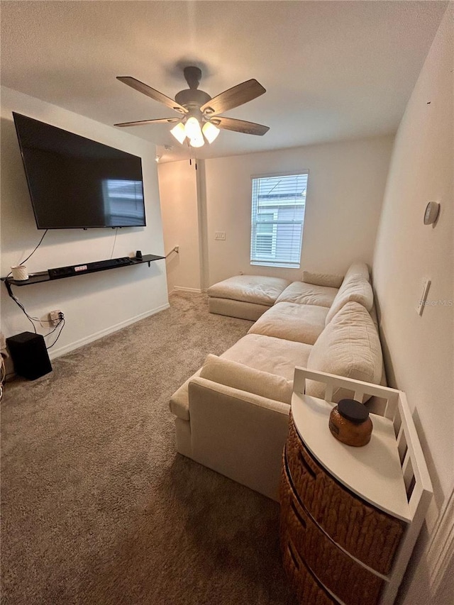 living room featuring carpet and ceiling fan