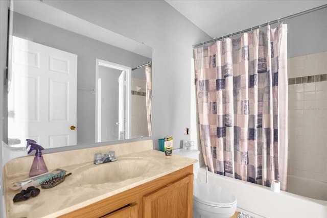 full bathroom featuring vanity, toilet, and shower / bathtub combination with curtain