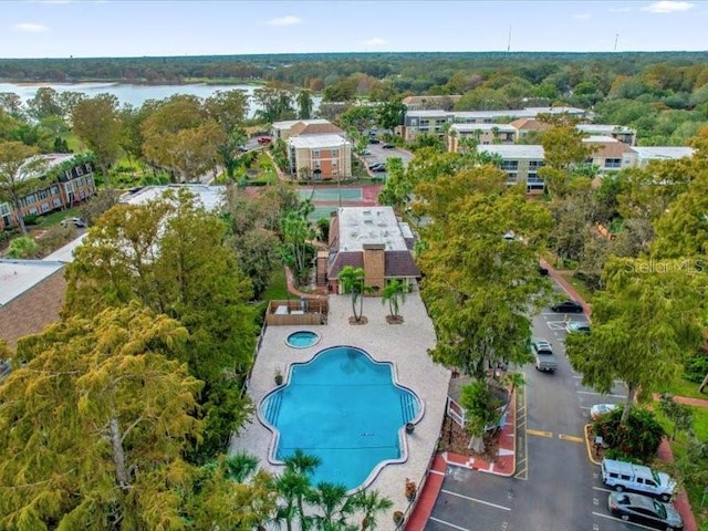 birds eye view of property featuring a water view