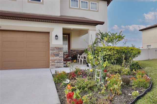 property entrance with a garage