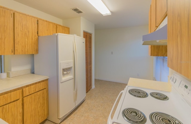 kitchen featuring white appliances