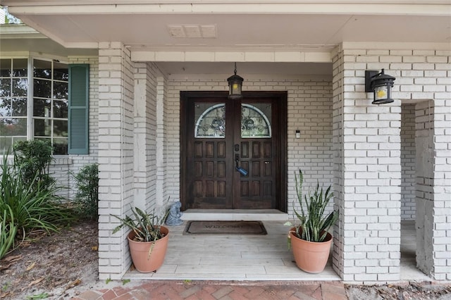 entrance to property featuring french doors