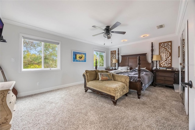 bedroom featuring ceiling fan, ornamental molding, and light carpet