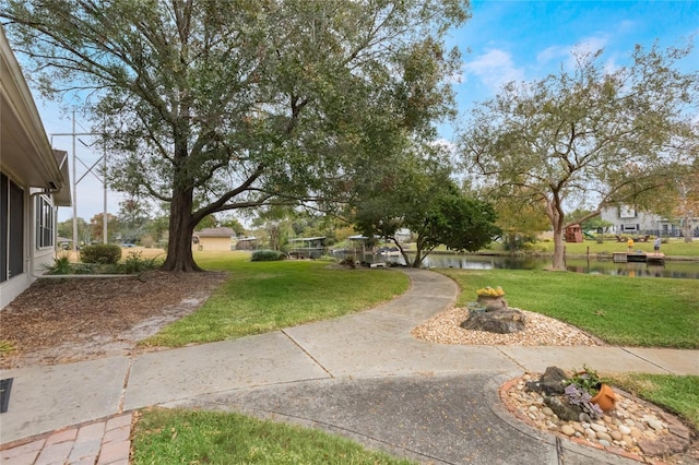 view of yard with a water view