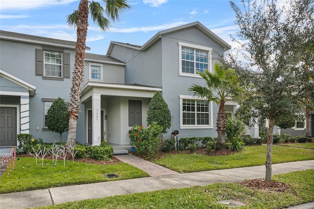 view of front of home featuring a front lawn