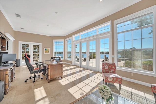 home office featuring ornamental molding, a water view, plenty of natural light, and french doors