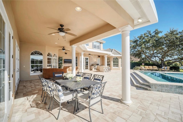 view of patio with ceiling fan