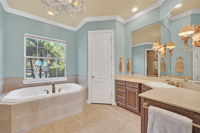 bathroom with an inviting chandelier, ornamental molding, vanity, tiled tub, and tile patterned flooring