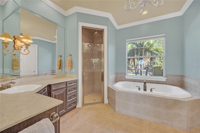 bathroom featuring crown molding, vanity, separate shower and tub, and tile patterned flooring