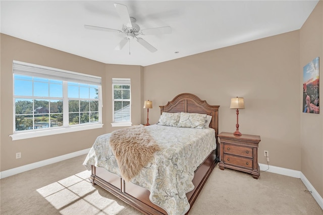 bedroom featuring ceiling fan and carpet flooring