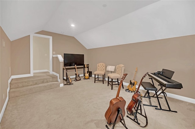 game room featuring light carpet and vaulted ceiling