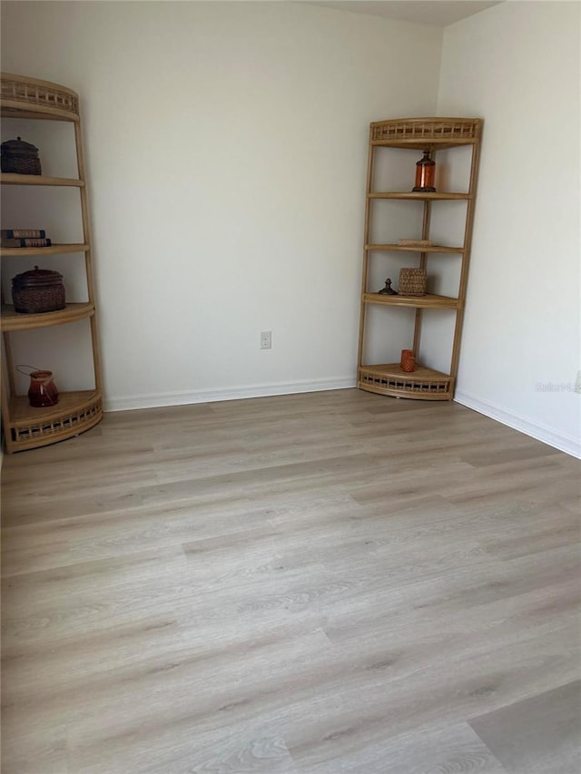 empty room with light wood-type flooring