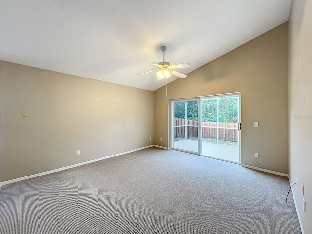 spare room with carpet, high vaulted ceiling, and ceiling fan