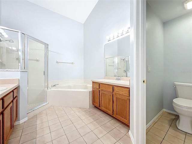 full bathroom featuring tile patterned flooring, toilet, vanity, and shower with separate bathtub