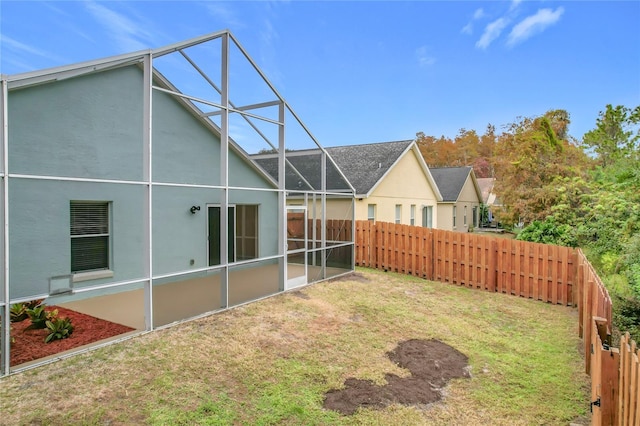 view of yard with a lanai