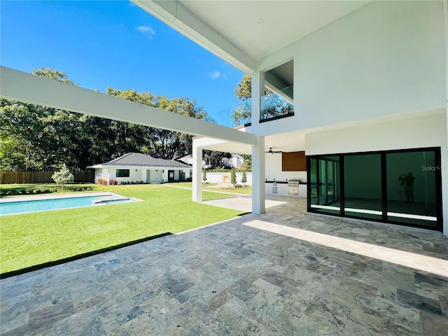 view of patio featuring exterior kitchen