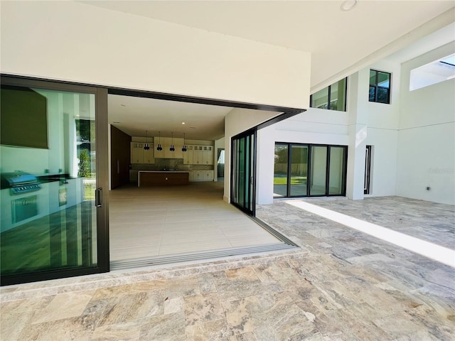 view of patio featuring a grill