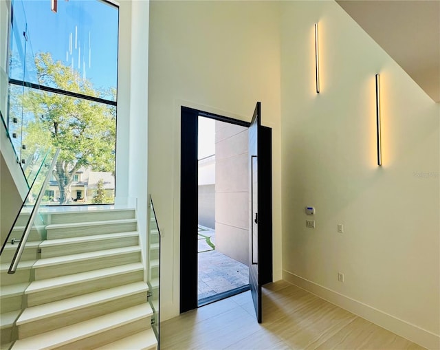 doorway with light wood-type flooring