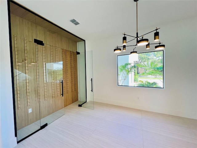 interior space featuring a notable chandelier