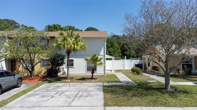 view of front of home with a front lawn