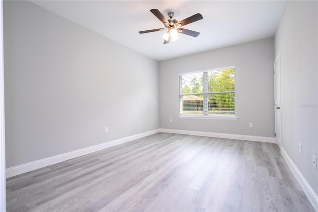 unfurnished room featuring ceiling fan and light hardwood / wood-style floors