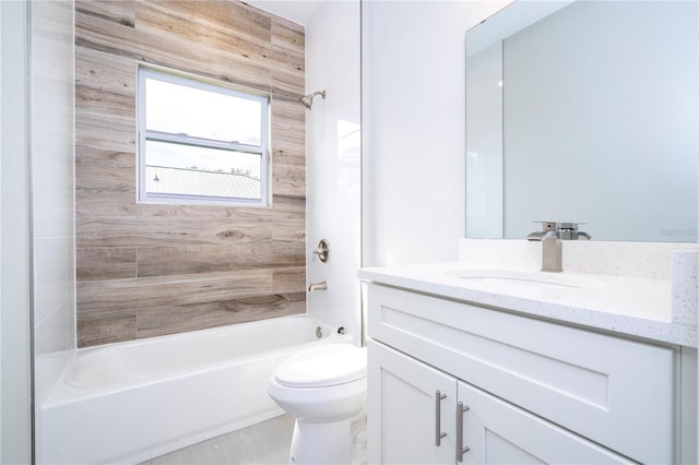 full bathroom with wood walls, toilet, vanity, and tiled shower / bath