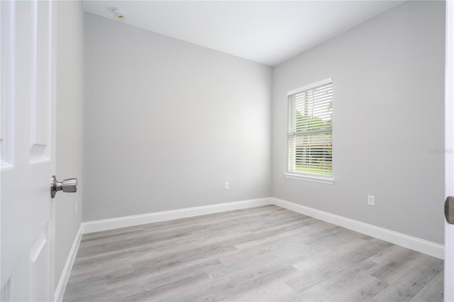 empty room with light wood-type flooring