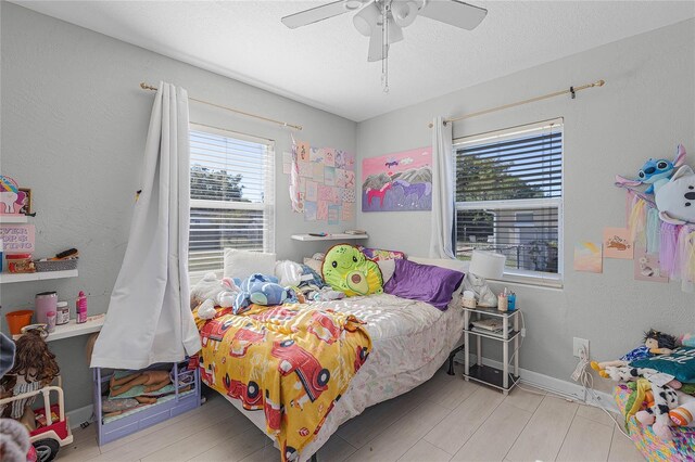 bedroom featuring ceiling fan