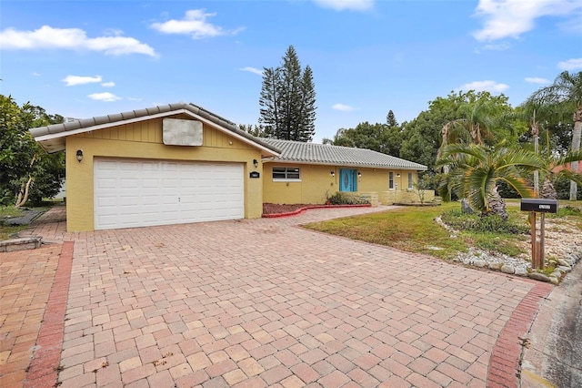 ranch-style house with a garage