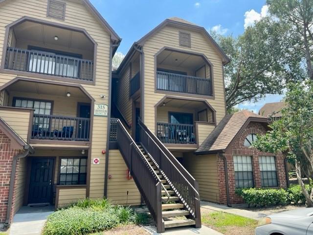 315 Lakepointe Dr Unit 302, Altamonte Springs, FL 32701 - view of property with stairs