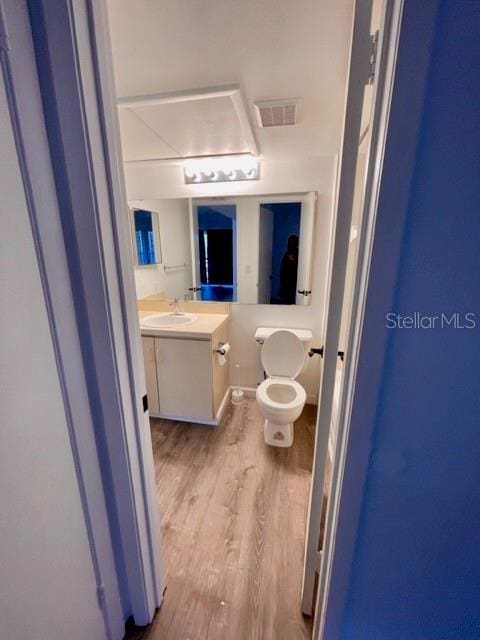 315 Lakepointe Dr Unit 302, Altamonte Springs, FL 32701 - bathroom with wood finished floors and vanity