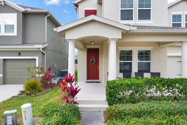 property entrance with a garage