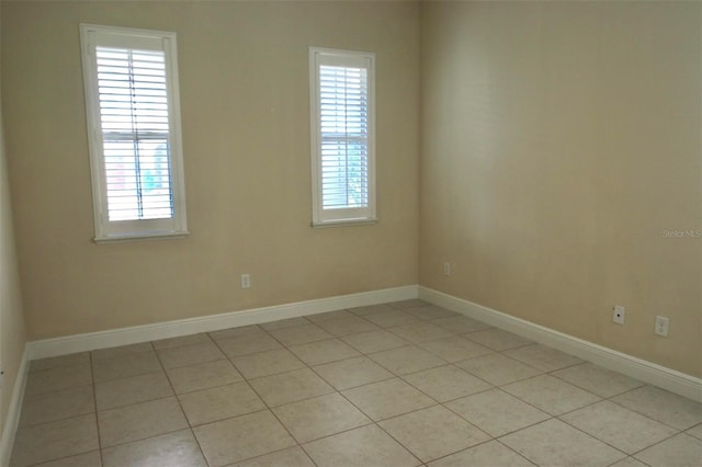 empty room featuring light tile patterned flooring