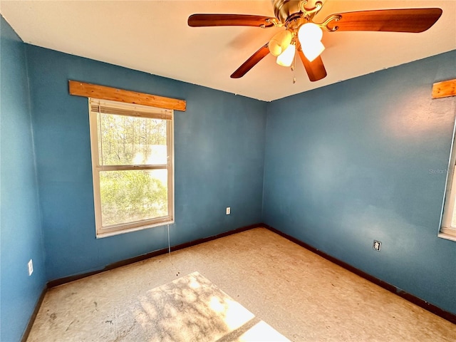 unfurnished room featuring ceiling fan