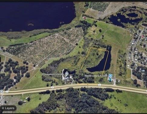 aerial view of property's location featuring property parcel outlined