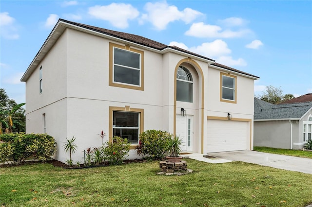 view of front of house featuring a front yard and a garage