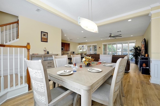 dining room featuring ceiling fan and light hardwood / wood-style flooring