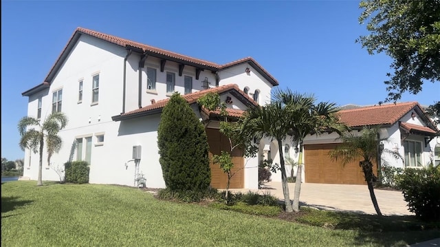 view of home's exterior with a lawn