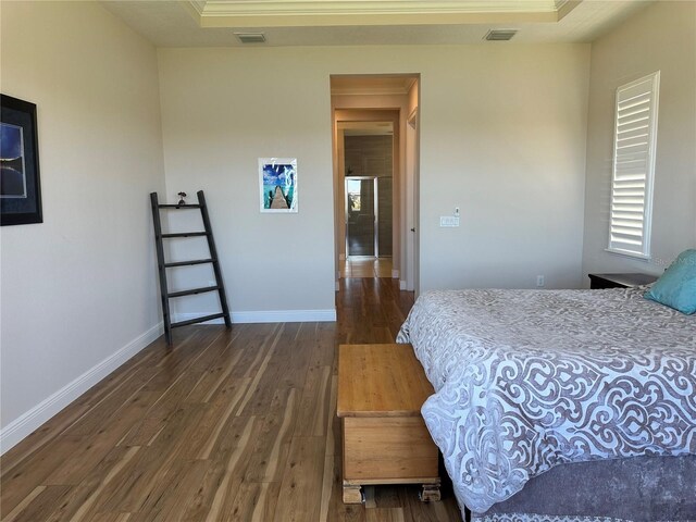 bedroom featuring dark hardwood / wood-style floors