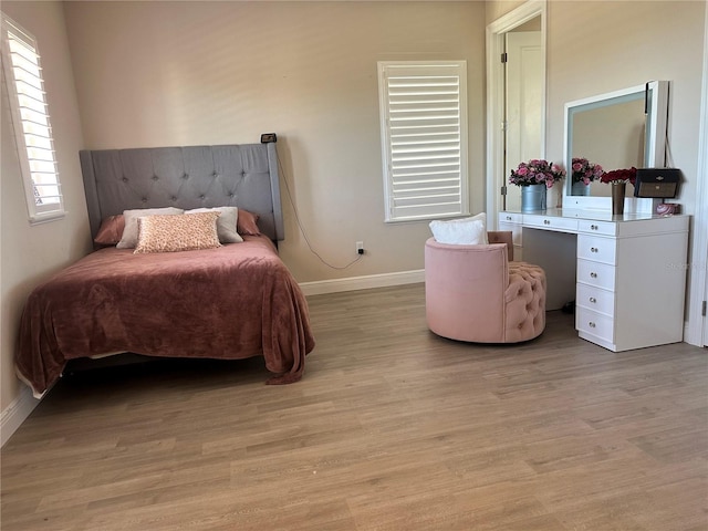 bedroom featuring light hardwood / wood-style floors