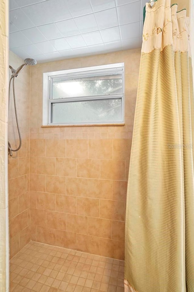 bathroom featuring walk in shower