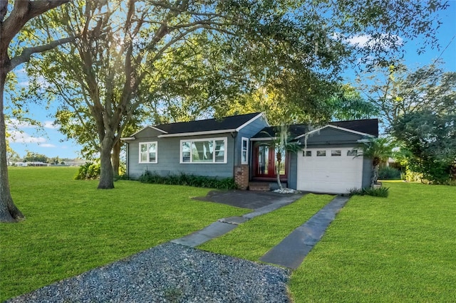 ranch-style house with a front lawn and a garage