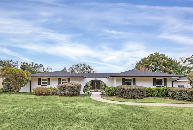 ranch-style house with a front yard