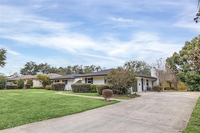 ranch-style house with a front yard