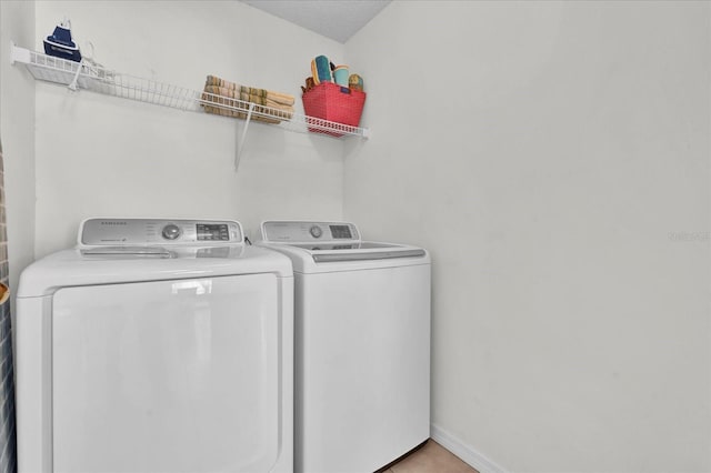 laundry room with washer and dryer