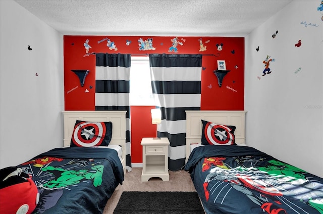 carpeted bedroom with a textured ceiling