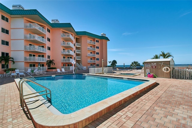 view of pool with a patio area