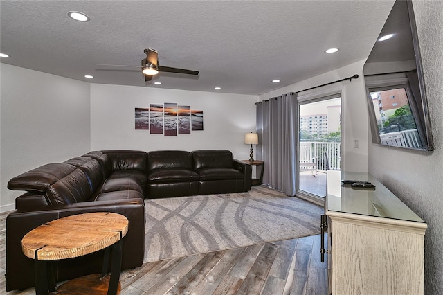 18400 Gulf Blvd Unit 1206, Indian Shores, FL 33785 - living area featuring wood finished floors, ceiling fan, a textured ceiling, and recessed lighting