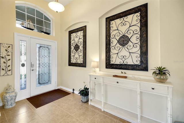 entryway featuring light tile patterned floors