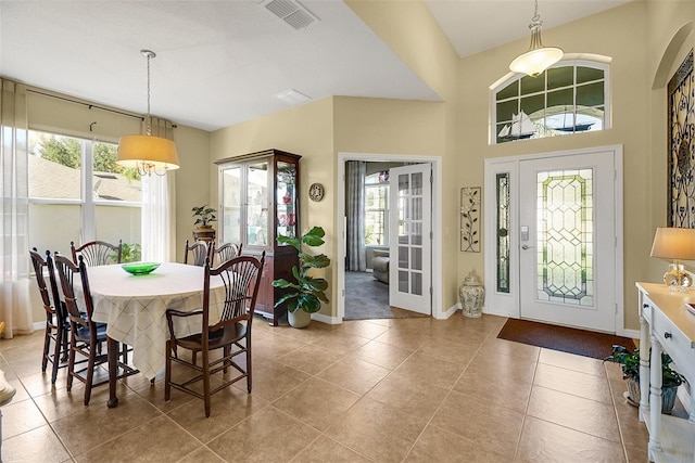 dining space featuring light tile patterned floors